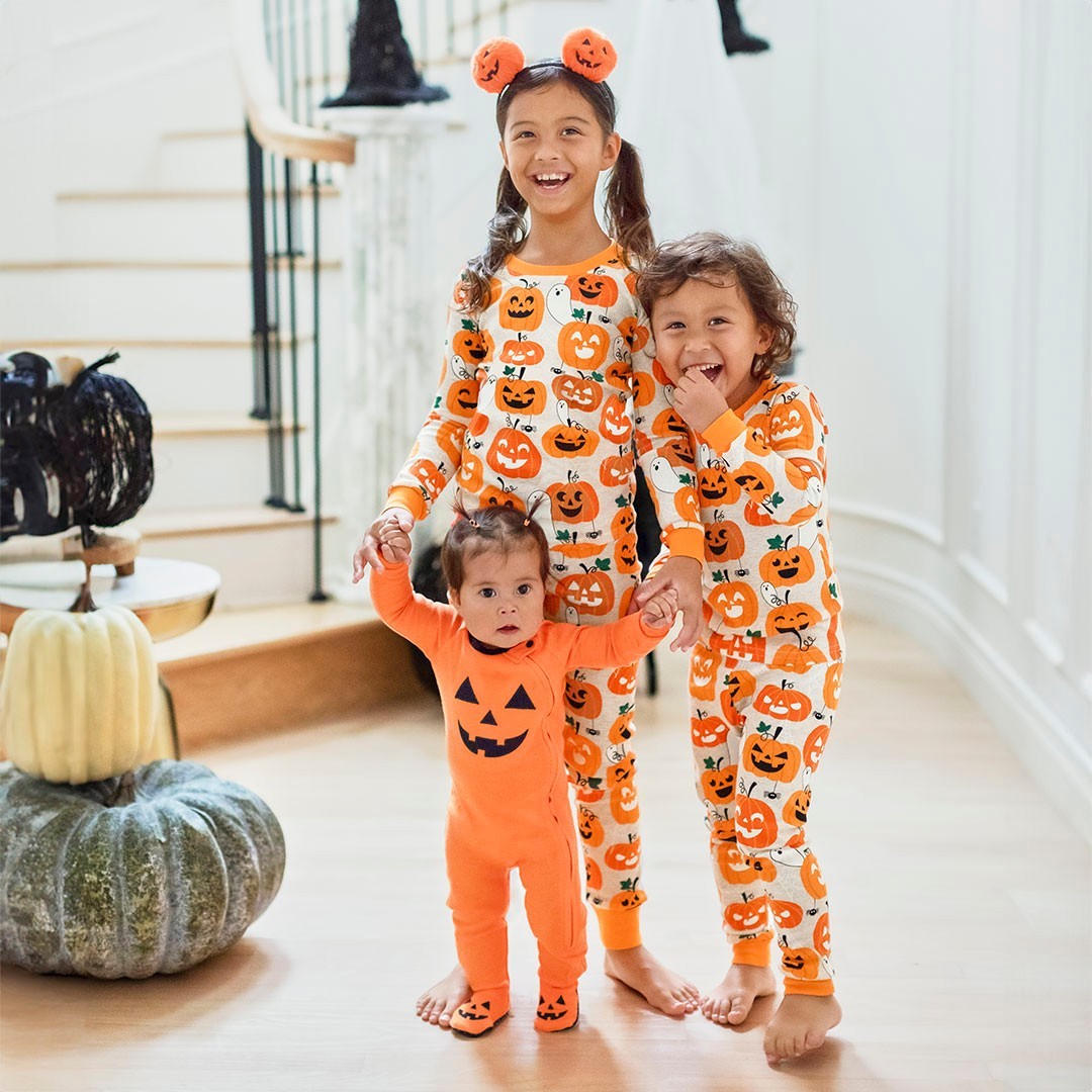 The Children_s Place Children wearing Halloween themed pajamas from The Children's Place