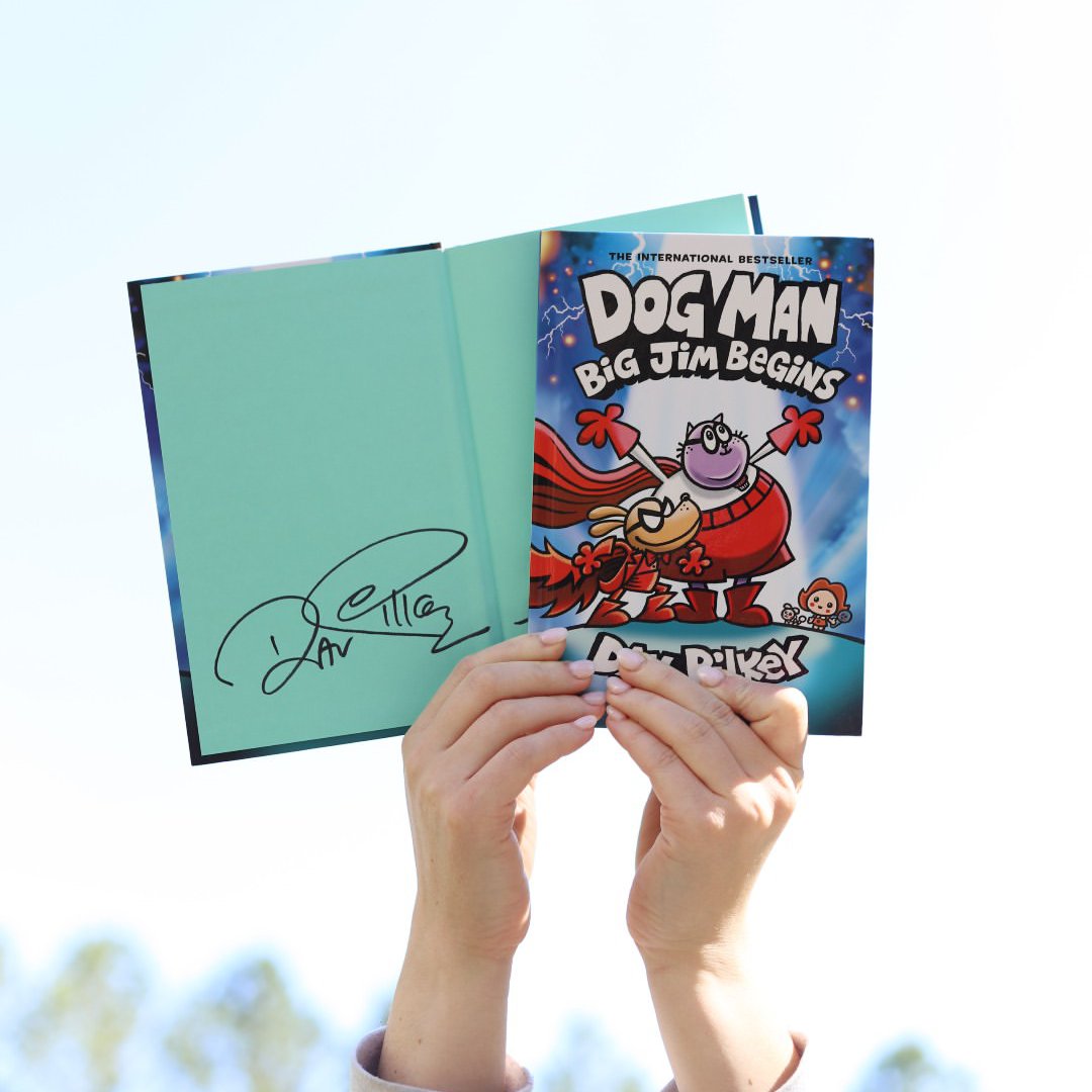 SnapInsta.to_491504497_18498616591012388_5778906607863086729_n Books-A-Million Dog Man book being held up